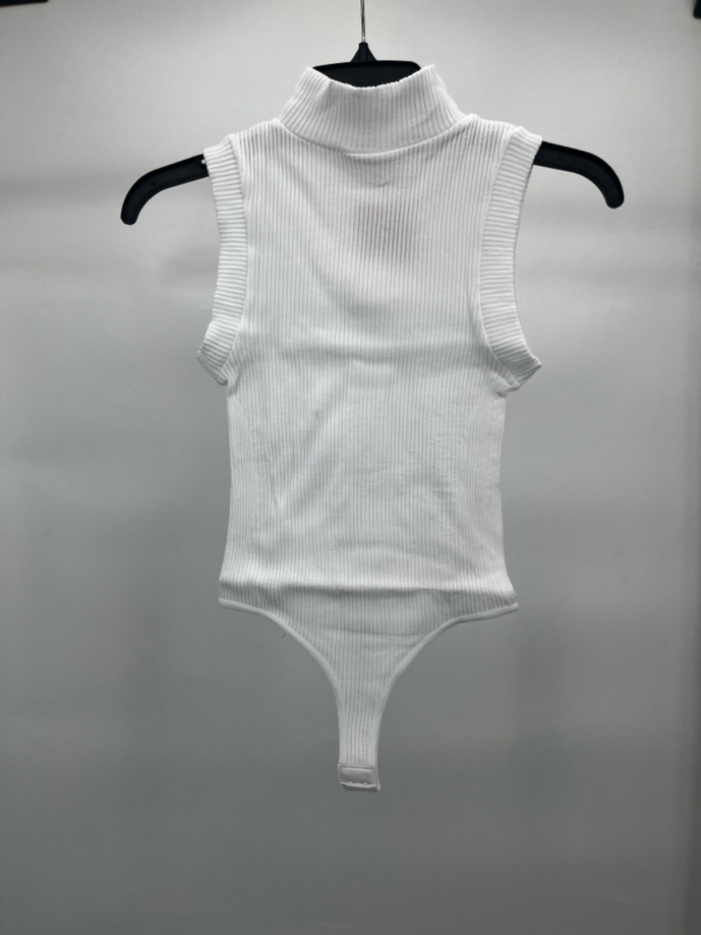 Women’s Dynamic Sleeveless Ribbed Turtleneck Bodysuit in White Clasps at Bottom